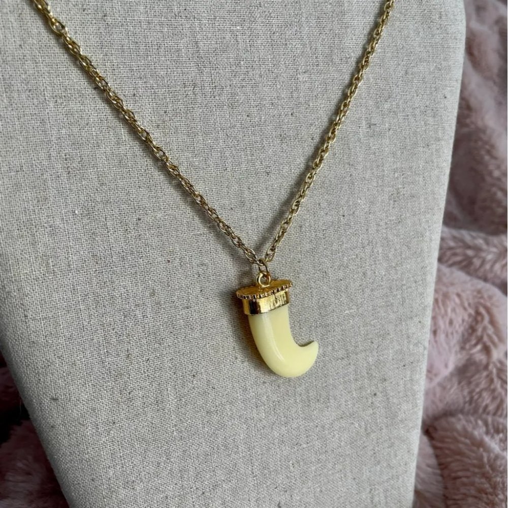 Faux Ivory Pendant on Long Gold Chain